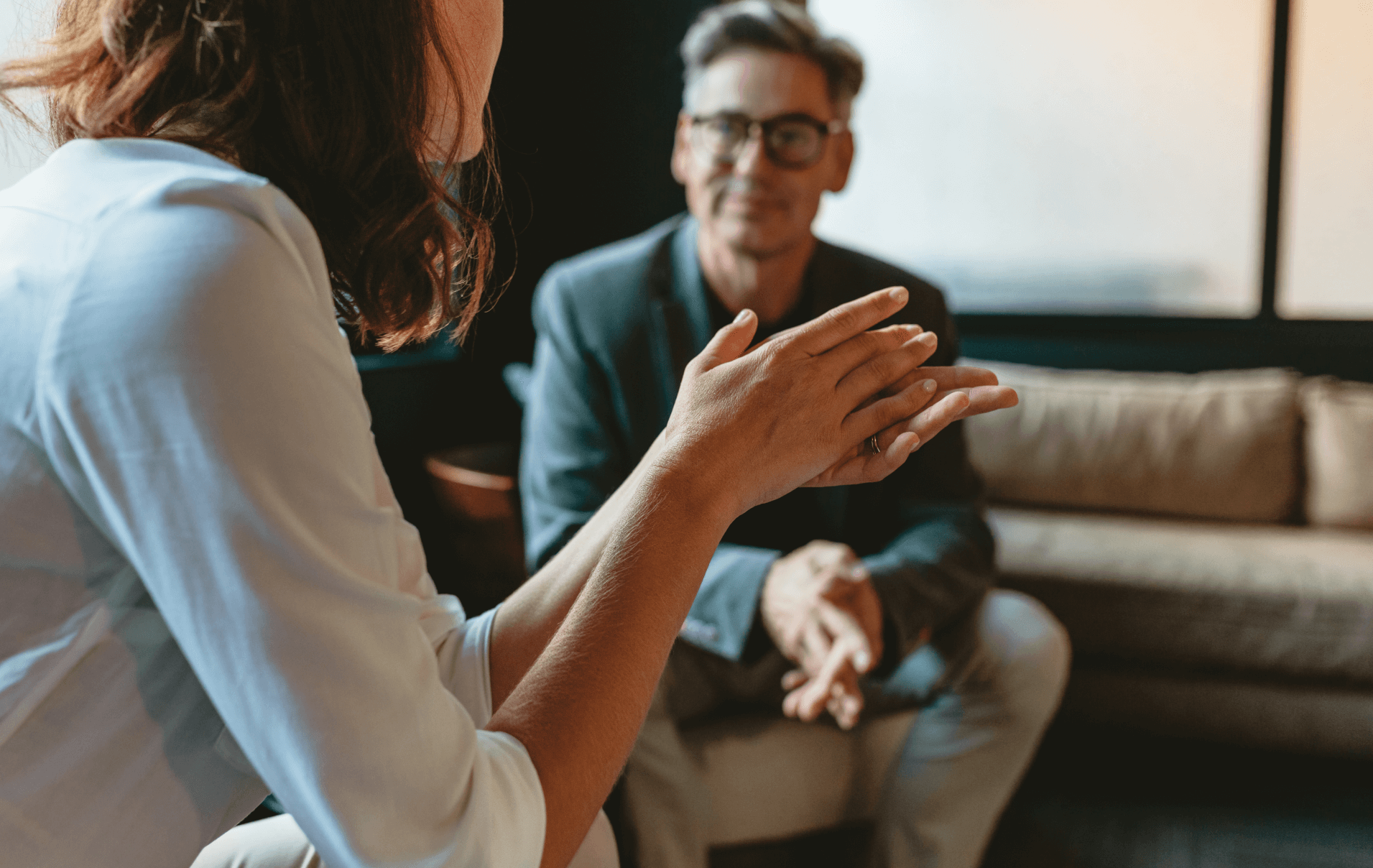Two people having a meeting in a lounge area